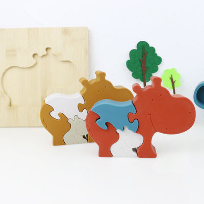 Silicone en de houten puzzel die dierlijke hippo het bevinden zich brengen jong geitjespeelgoed voor kind het spelen in verwarring