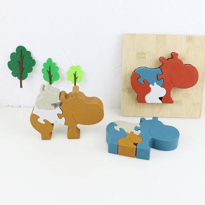 Silicone en de houten puzzel die dierlijke hippo het bevinden zich brengen jong geitjespeelgoed voor kind het spelen in verwarring