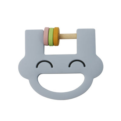 Van het Siliconejonge geitjes van het glimlachgezicht past de Leuke van het het Speelgoedsilicone Rammelaar Teether met Embleemoem ODM aan