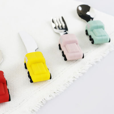 De Babylepel van het peuterroestvrije staal met het Siliconehandvat van de Autovorm