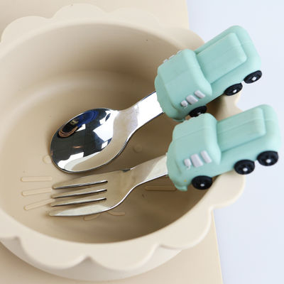 De Babylepel van het peuterroestvrije staal met het Siliconehandvat van de Autovorm
