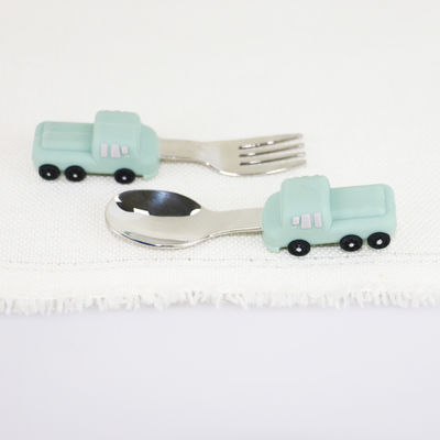 De Babylepel van het peuterroestvrije staal met het Siliconehandvat van de Autovorm