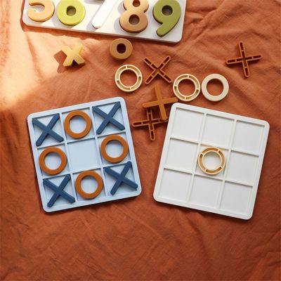 MOQ 50 Sets Silicone XO Tic Tac Toe Puzzle Aanpasbaar Logo Kleuren BPA Gratis CE Certificaat Silicone Speelgoed