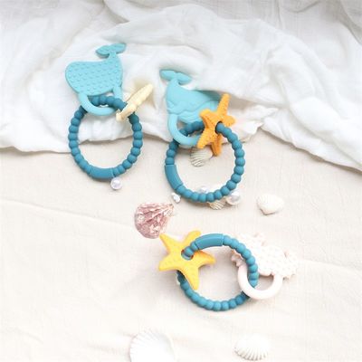 Voedselkwaliteit siliconen baby tether met niet-giftig ontwerp en makkelijke greep handgreep BPA-vrij siliconen tanden ringen